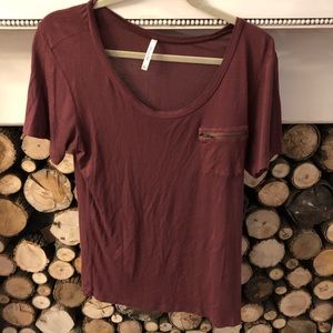 Burgundy top with zip pocket detail